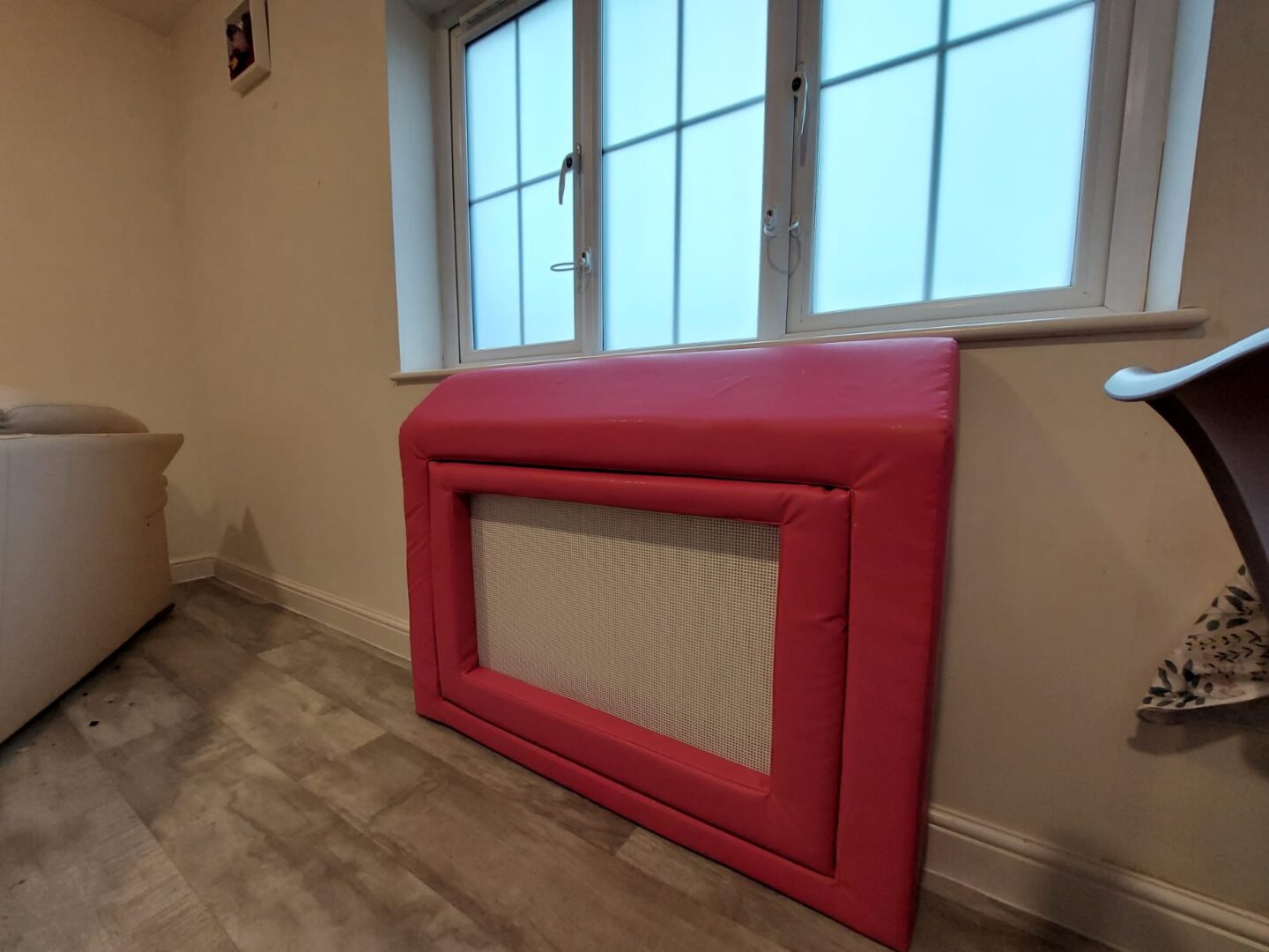 Radiator padding with slanted top